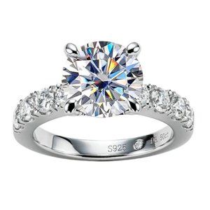 Sterling Silver Solitaire Ring with White Cubic Zirconia Accent Stones
